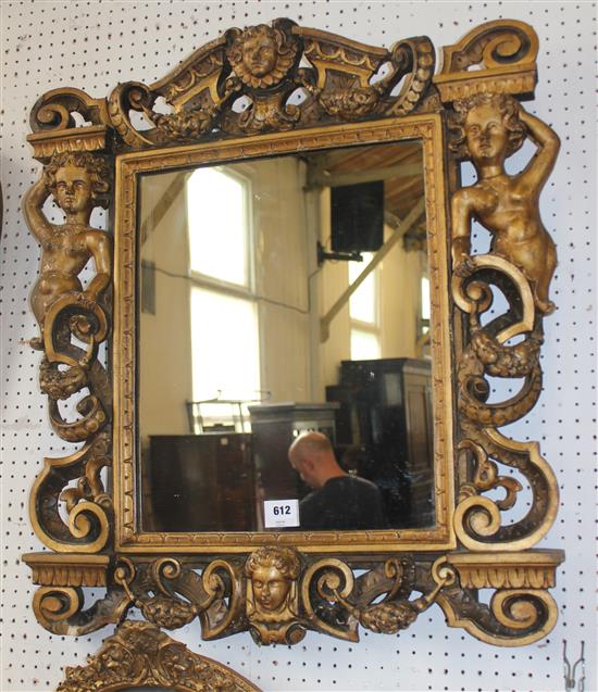 An Italian baroque style gilt gesso wall mirror, 2ft x 2ft 6in.